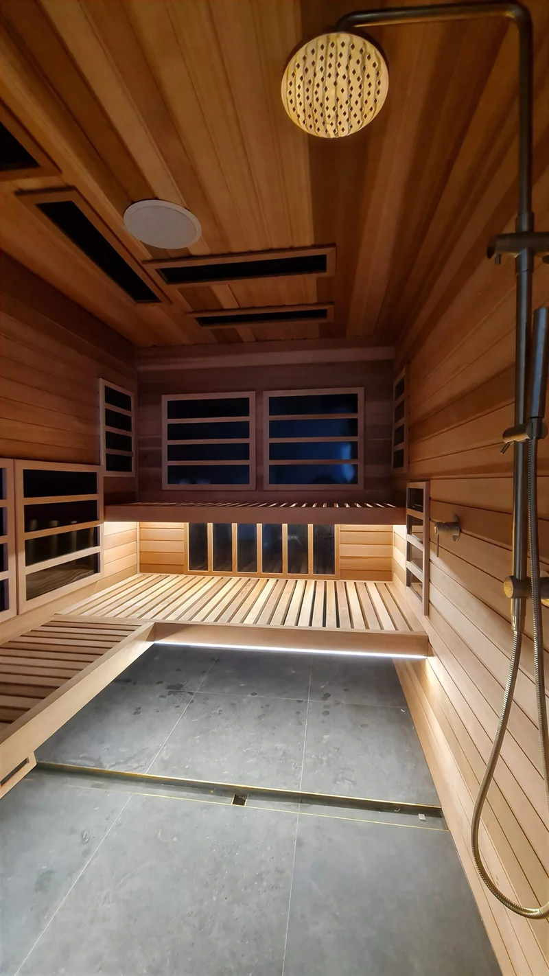Infrared sauna paired with a glass shower enclosure
