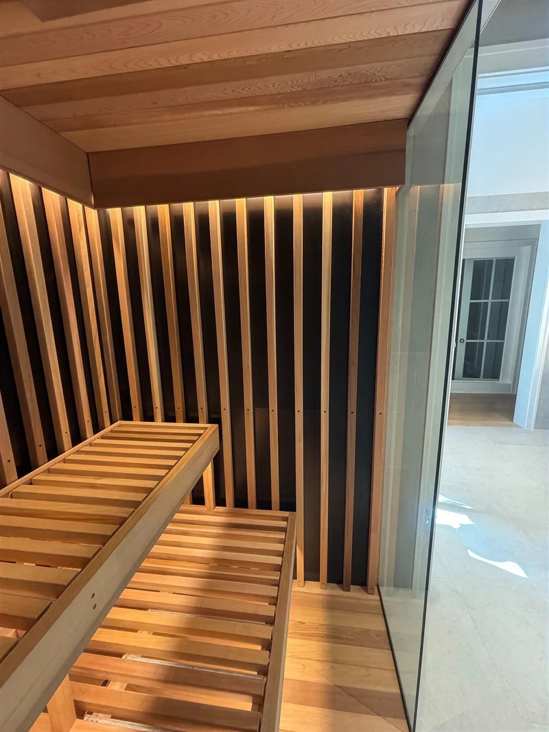 Close detail of custom joinery on a sauna bench